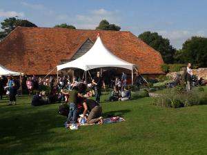 families sitting in the barn area at Ufton C